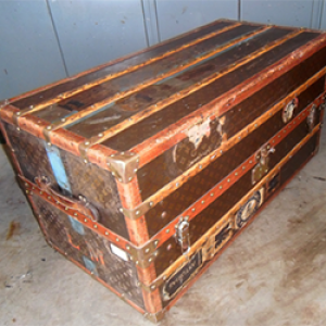 antieke koffer restaureren voor